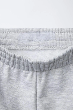 Брюки-джоггеры с текстом- Заказать в России