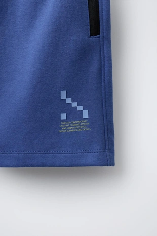 Спортивные шорты-бермуды с карманами- Заказать в России