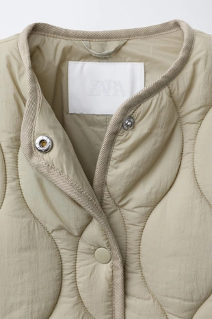 Длинный стеганый комбинезон - Заказать в России