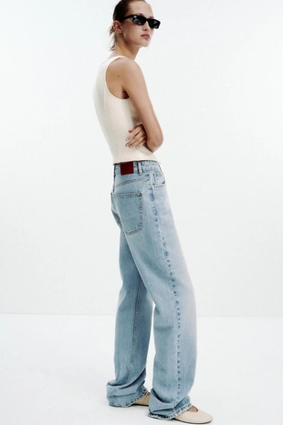 Топ из интерлока с V-образным вырезом- Заказать в России