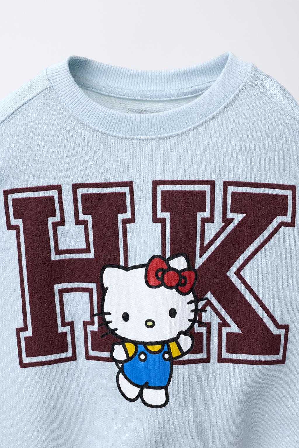 ТОЛСТОВКА С ПРИНТОМ HELLO KITTY © SANRIO