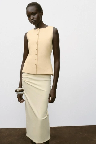 Трикотажный жилет с пуговицами- Заказать в России