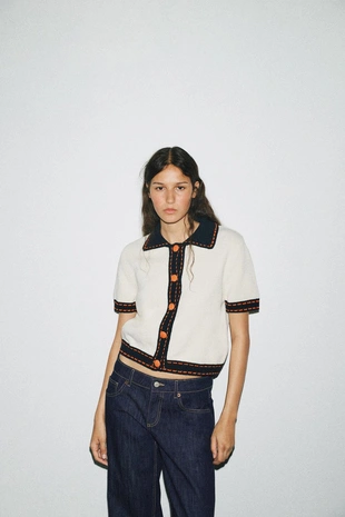 Трикотажная куртка с короткими рукавами и декоративной строчкой- Заказать в России