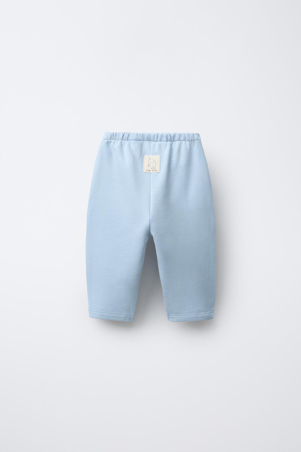 БРЮКИ BAGGY ИЗ МЯГКОЙ ТКАНИ С НАШИВКОЙ