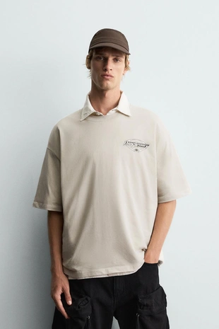 Футболка с графическим рисунком из ткани с эффектом потертости