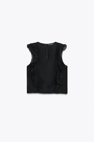 Полупрозрачная блузка с воланами