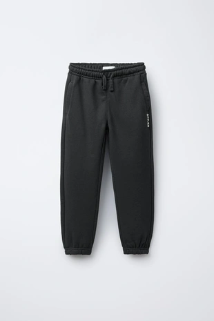 Комплект из толстовки с короткими рукавами и брюк-джоггеров с текстом- Заказать в России