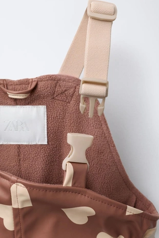 Прорезиненный комбинезон с принтом WATER RESISTANT- Заказать в России