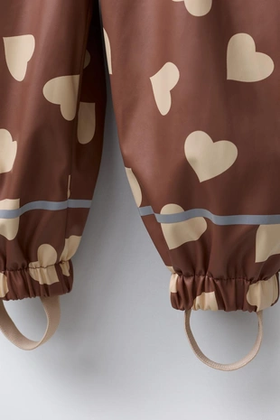 Прорезиненный комбинезон с принтом WATER RESISTANT- Заказать в России