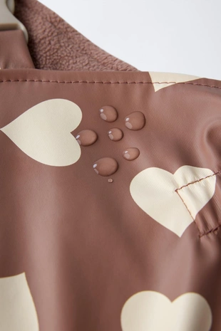 Прорезиненный комбинезон с принтом WATER RESISTANT- Заказать в России