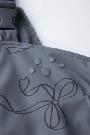 Прорезиненный комбинезон с принтом WATER RESISTANT- Заказать в России