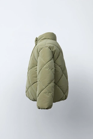 Стеганая куртка из прорезиненной ткани