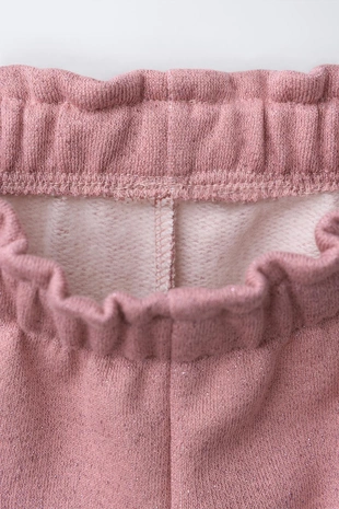 Брюки флисовые с блестящими бантами