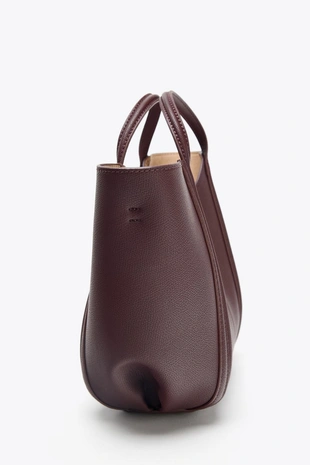 Небольшая сумка с декоративной строчкой