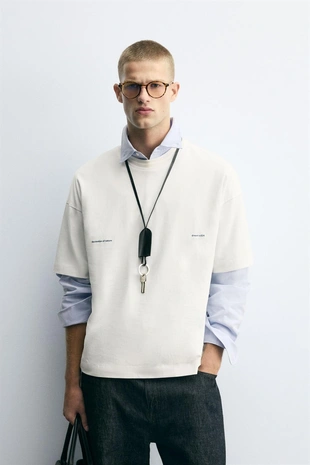 Футболка с комбинированным принтом- Заказать в России