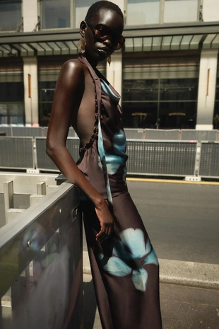 Атласные брюки с цветочным принтом- Заказать в России