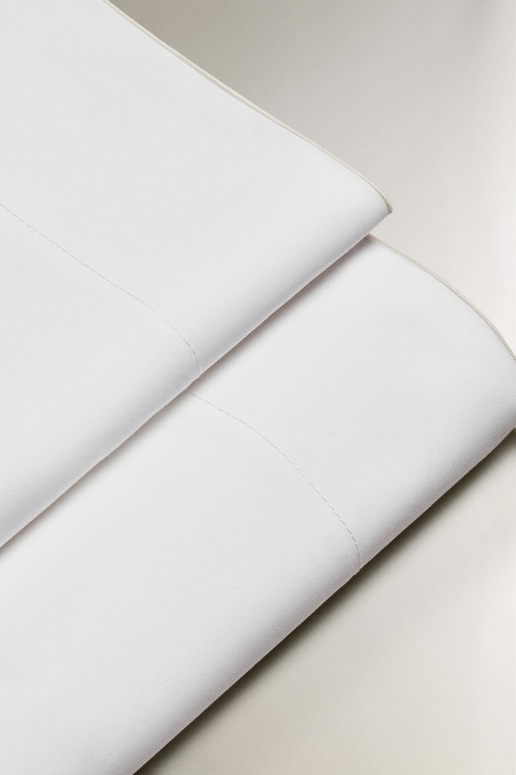 Плоское простынное изделие overlock