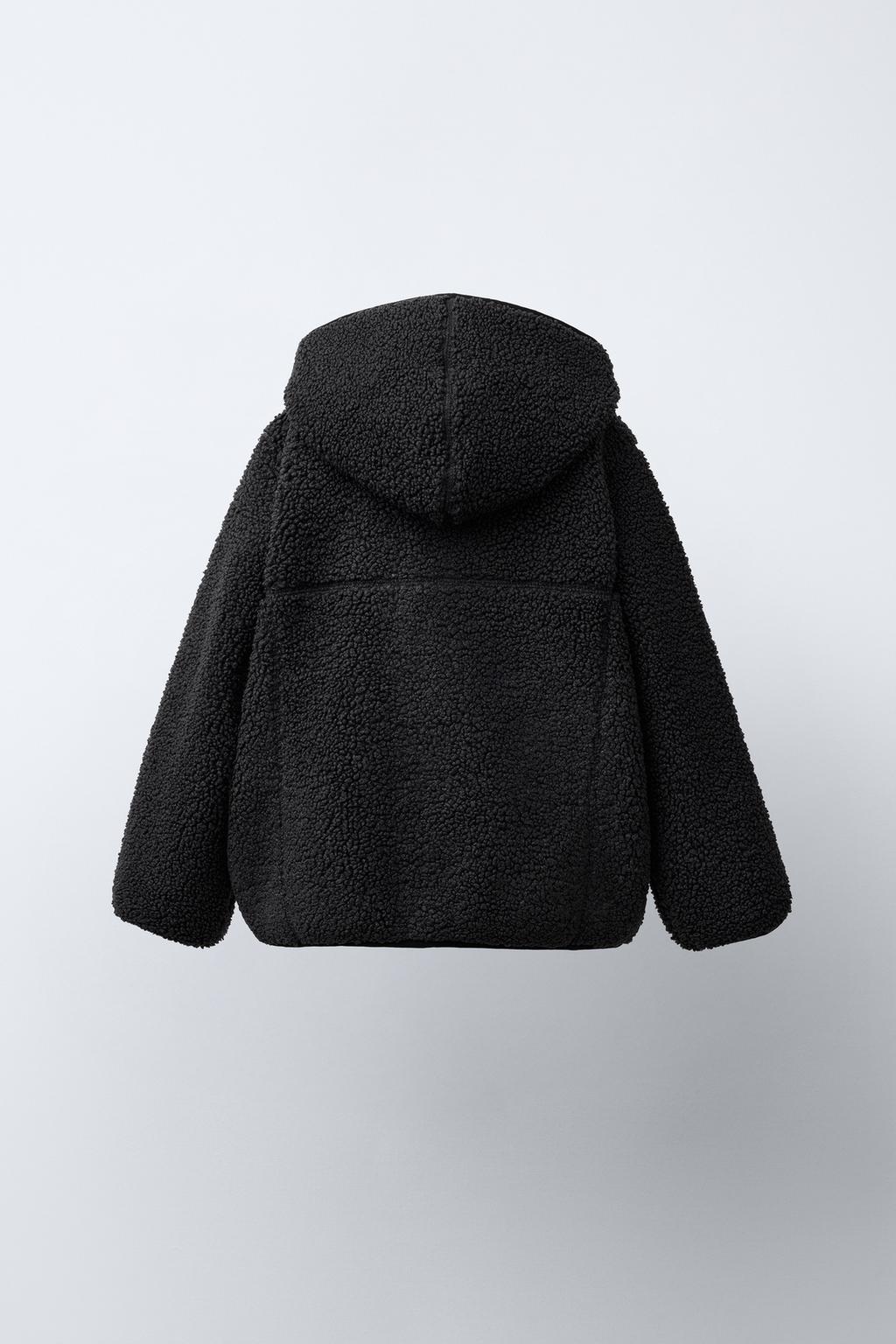 КУРТКА ИЗ ИСКУССТВЕННОЙ ОВЧИНЫ С КАПЮШОНОМ