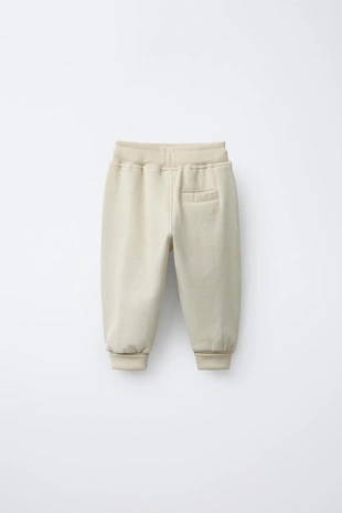 Брюки-джоггеры с логотипом и флоковым покрытием- Заказать в России