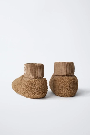 Тапочки-носки с львом- Заказать в России