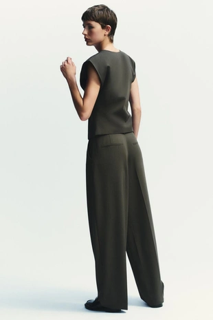 Брюки со складками и поясом- Заказать в России