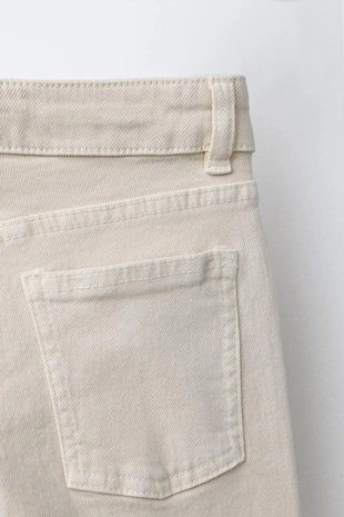 Брюки клеш с заклепками- Заказать в России