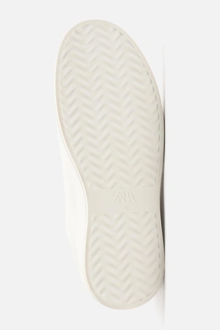 Кожаные кроссовки на объемной подошве