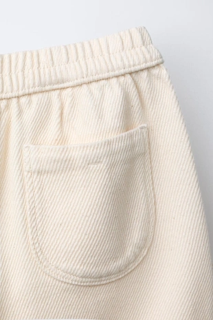 Брюки из мягкой ткани с пуговицами