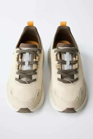 Спортивные кроссовки с деталями на подошве- Заказать в России