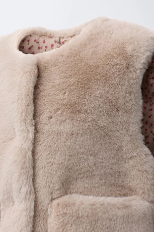 Жилет из искусственного меха- Заказать в России