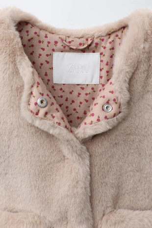 Жилет из искусственного меха- Заказать в России