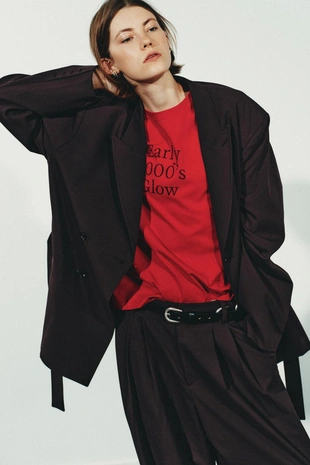 Брюки со складками, пуговицей снизу- Заказать в России