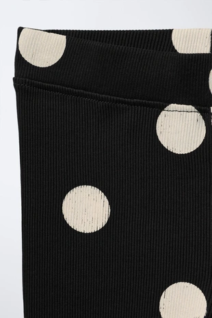 Легинсы в рубчик с принтом