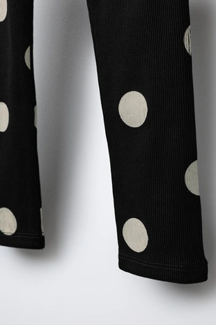 Легинсы в рубчик с принтом