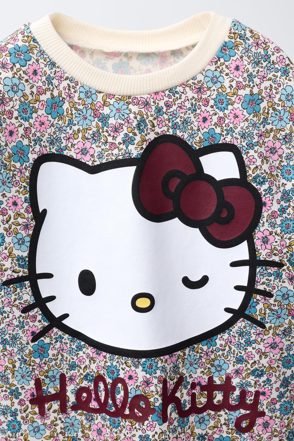ЛОНГСЛИВ С ЦВЕТОЧНЫМ ПРИНТОМ HELLO KITTY ©