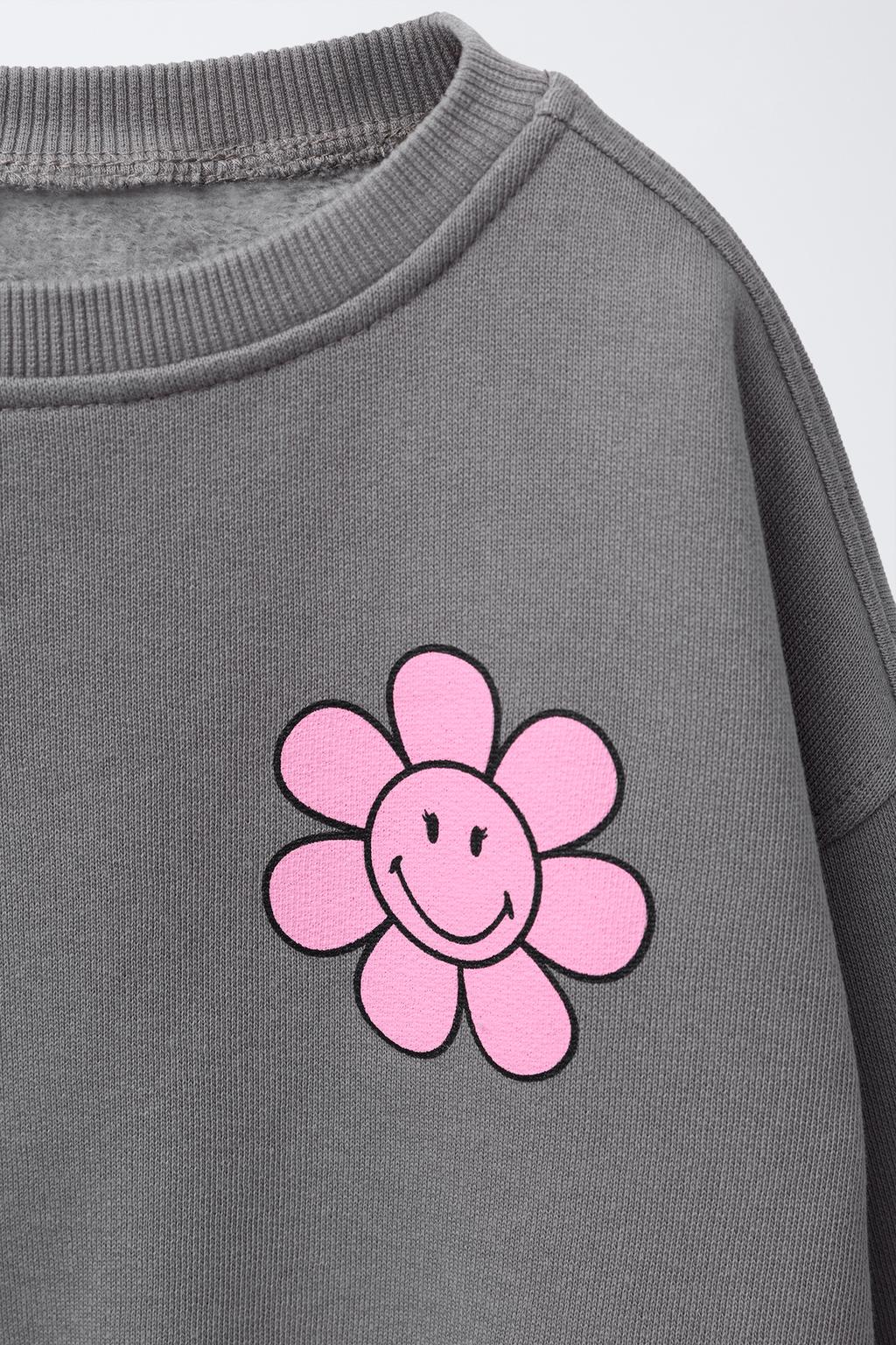 ТОЛСТОВКА С ЦВЕТОЧНЫМ ПРИНТОМ SMILEYWORLD ®
