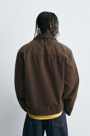 Куртка-рубашка из рельефной ткани с вышивкой- Заказать в России