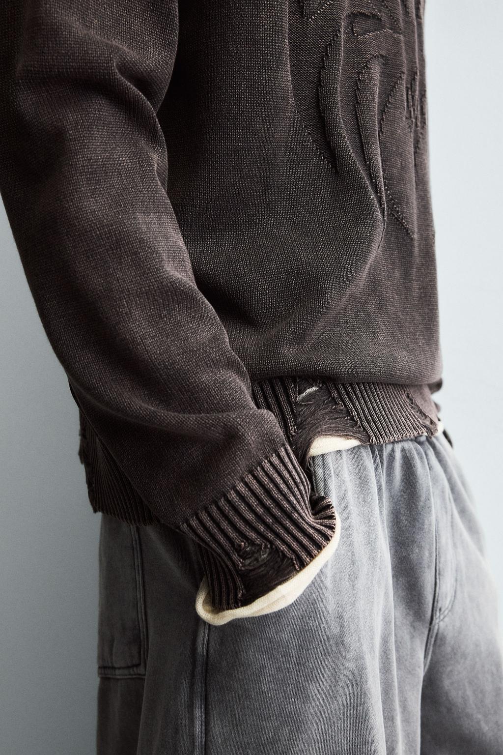 REVERSIBLE SWEATER WITH RIPPED EFFECT