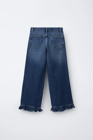 Джинсы с оборкой по низу- Заказать в России