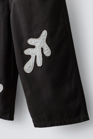 Брюки с листьями-нашивками- Заказать в России