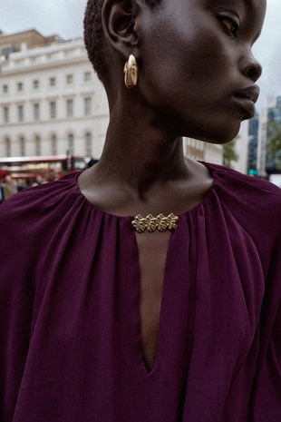 Полупрозрачная блуза с фурнитурой- Заказать в России