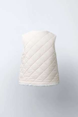 Двусторонний жилет из искусственного меха- Заказать в России