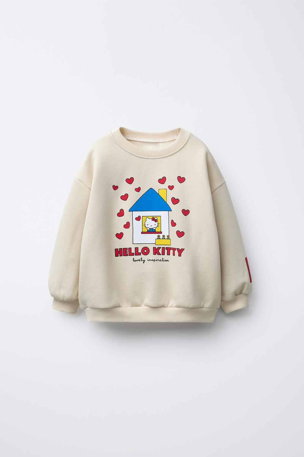 ТОЛСТОВКА HELLO KITTY © SANRIO С ПРИНТОМ «ДОМИК»