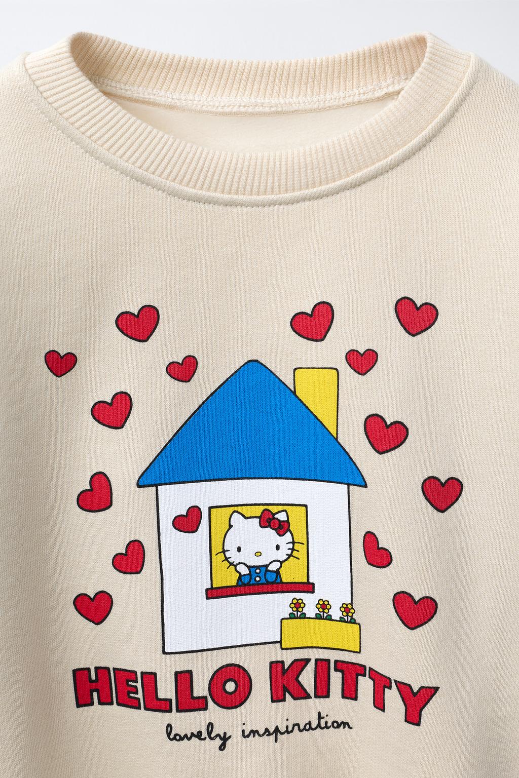 ТОЛСТОВКА HELLO KITTY © SANRIO С ПРИНТОМ «ДОМИК»