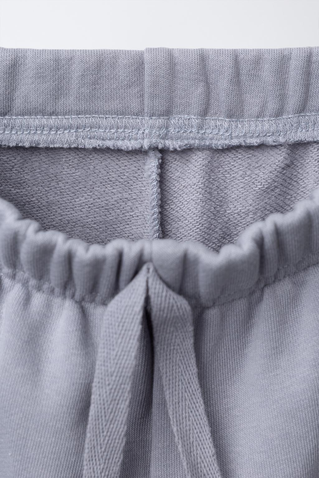 БРЮКИ-ДЖОГГЕРЫ С КАРМАНОМ-СЕРДЦЕМ