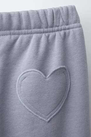 Брюки-джоггеры с карманом-сердцем- Заказать в России