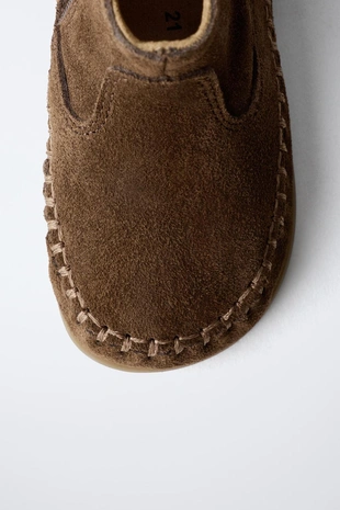 Кожаные сапоги с бахромой- Заказать в России