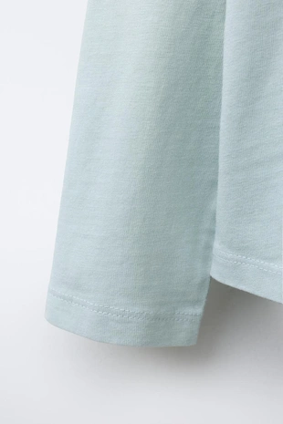 Лонгслив из ткани с эффектом потертости с надписью