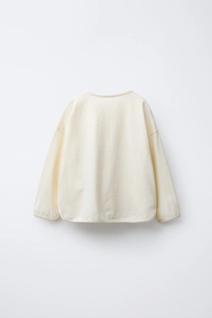 Футболка с надписью и нашивками- Заказать в России