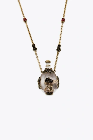 Металлическое ожерелье с цветами и бутылкой- Заказать в России